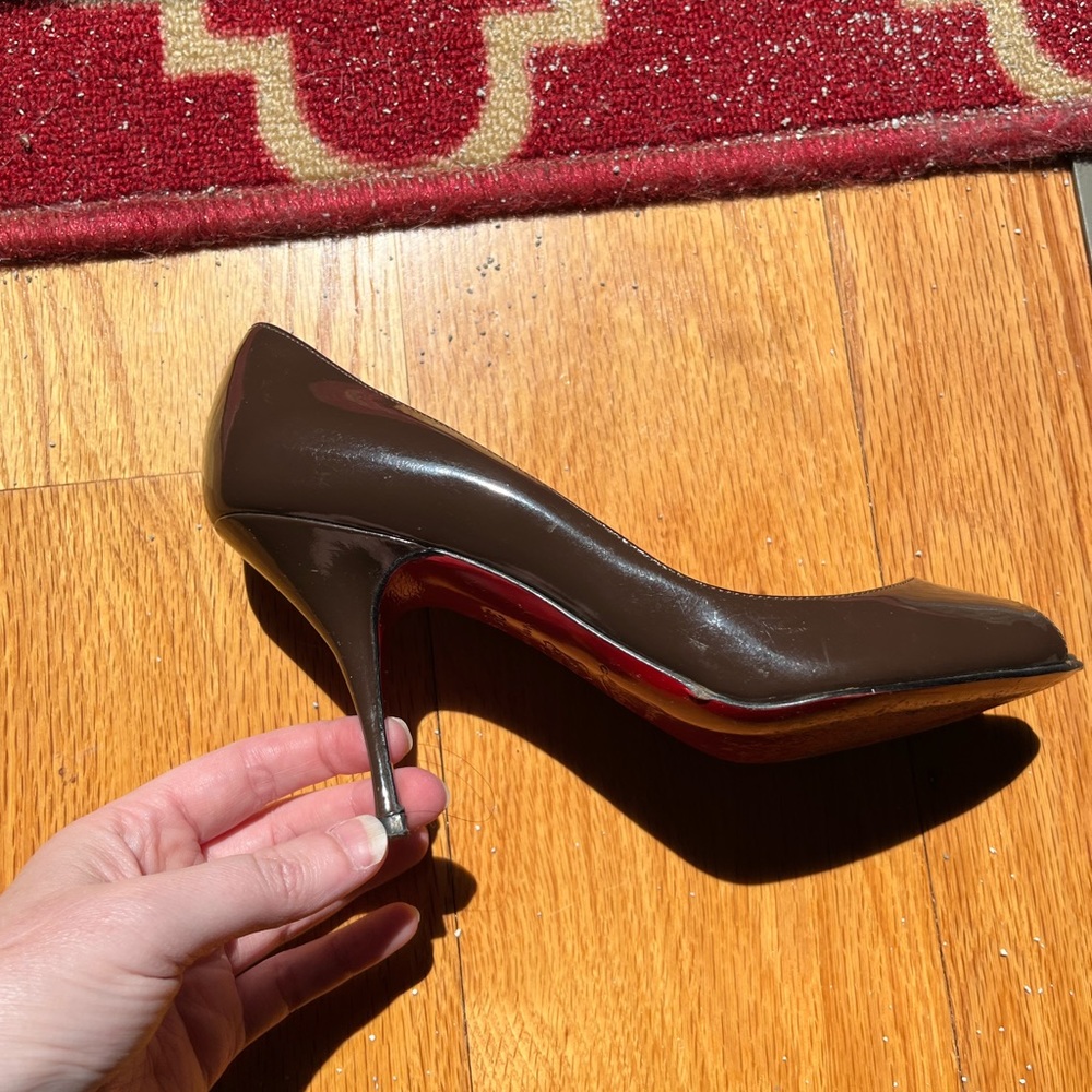 Louboutin chocolate patent leather peep toe pumps